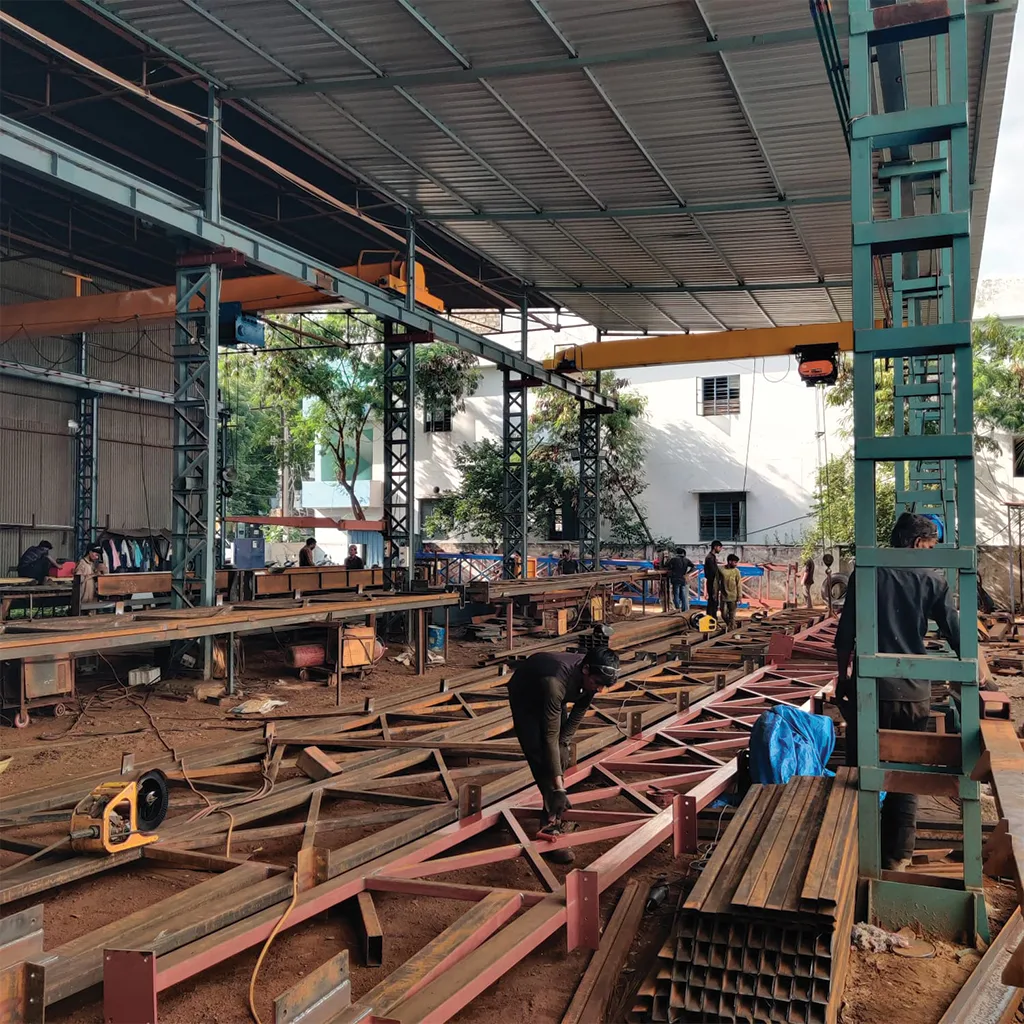 Electric single girder crane installed in a manufacturing facility