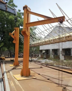Jib Crane Manufacturer in Hyderabad – Types & Uses 3 Wall-mounted jib crane manufacturer in hyderabad installed in workshop for material handling