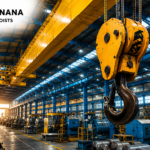 Heavy duty crane maintenance equipment with industrial overhead crane hook at Sri Gajanana Cranes & Hoists manufacturing facility in India.